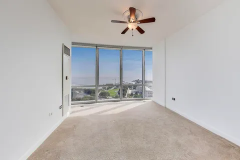 an empty room with fan