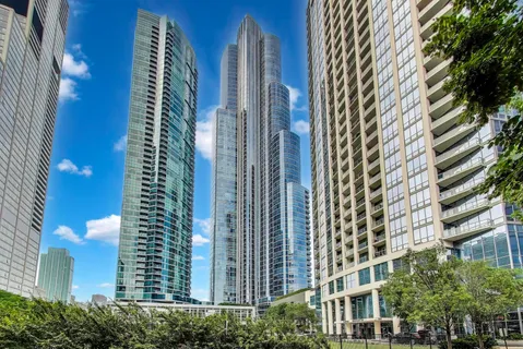 a view of a city with tall buildings