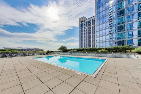 a view of a building with sitting area