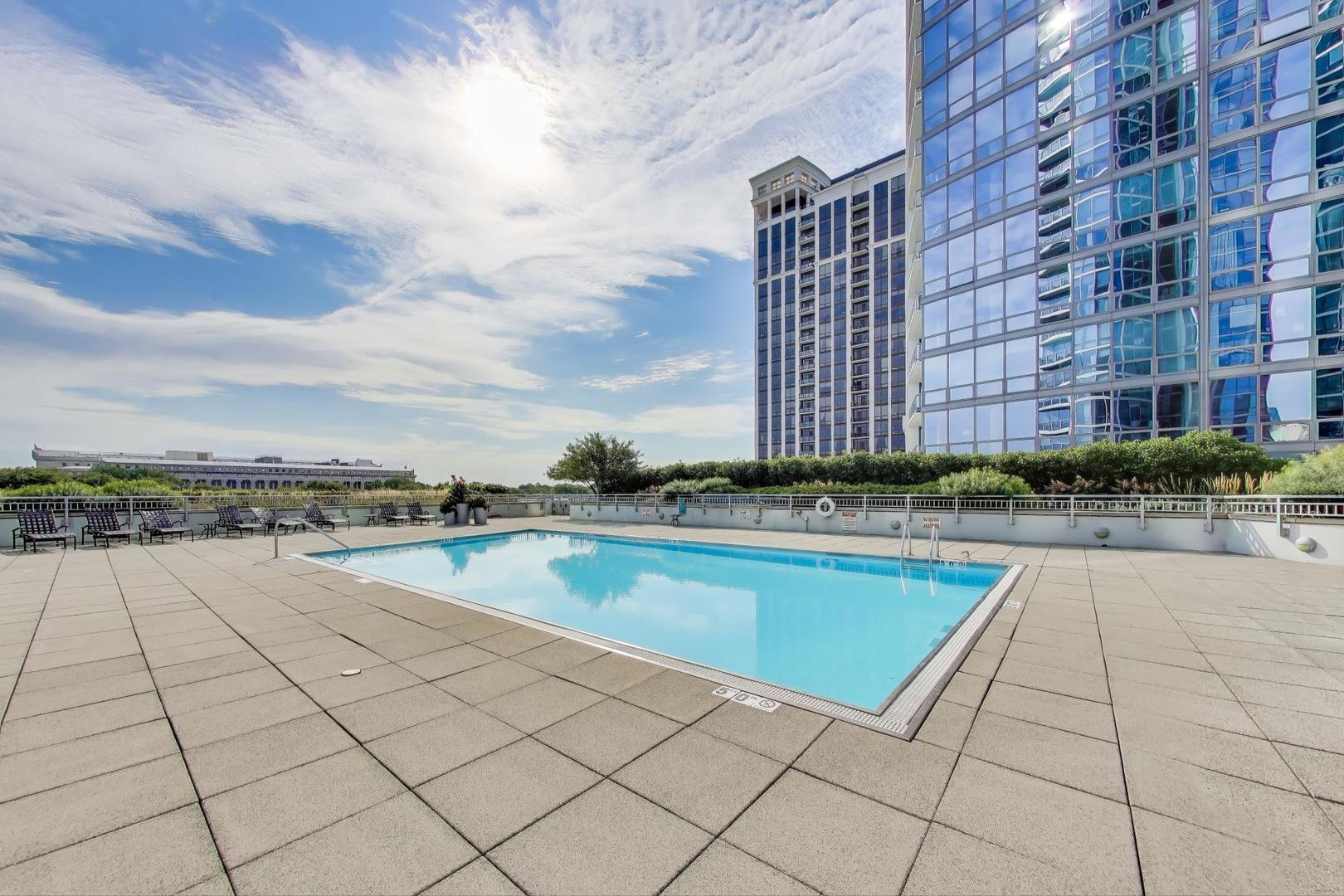 1211 South Prairie Avenue, Unit 2003 Chicago, IL 60605 - Photo 35 of 40 a view of swimming pool with outdoor seating and plants