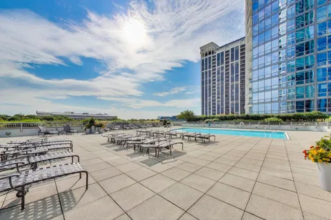 a view of steet with balcony