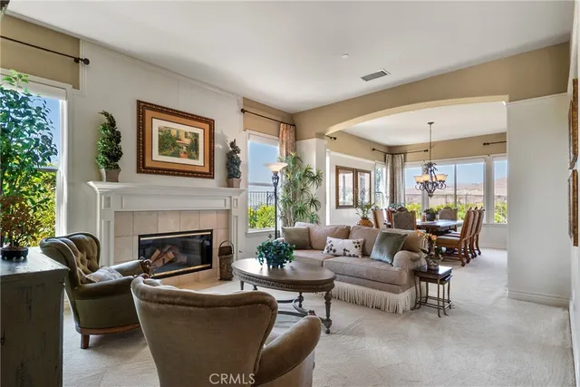 a view of a dining area with furniture and window