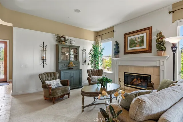 a kitchen with stainless steel appliances kitchen island granite countertop a stove a sink and a refrigerator