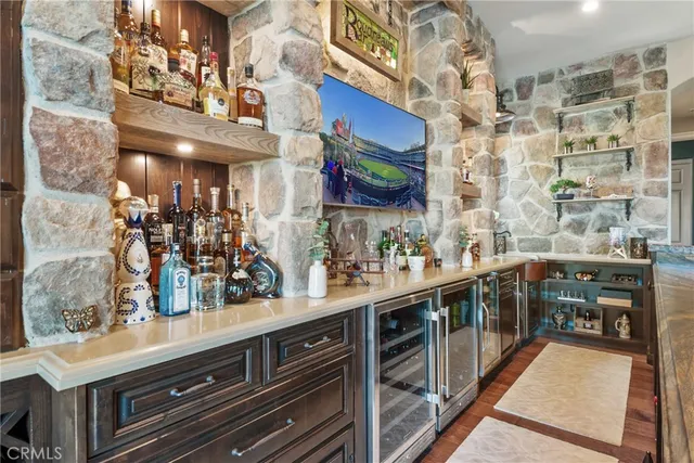 a view of a patio with table and chairs and potted plants