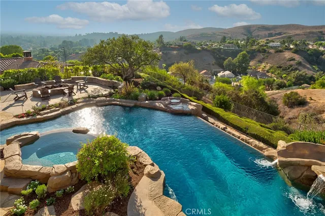 a view of a park with large trees