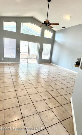 a view of an empty room and window
