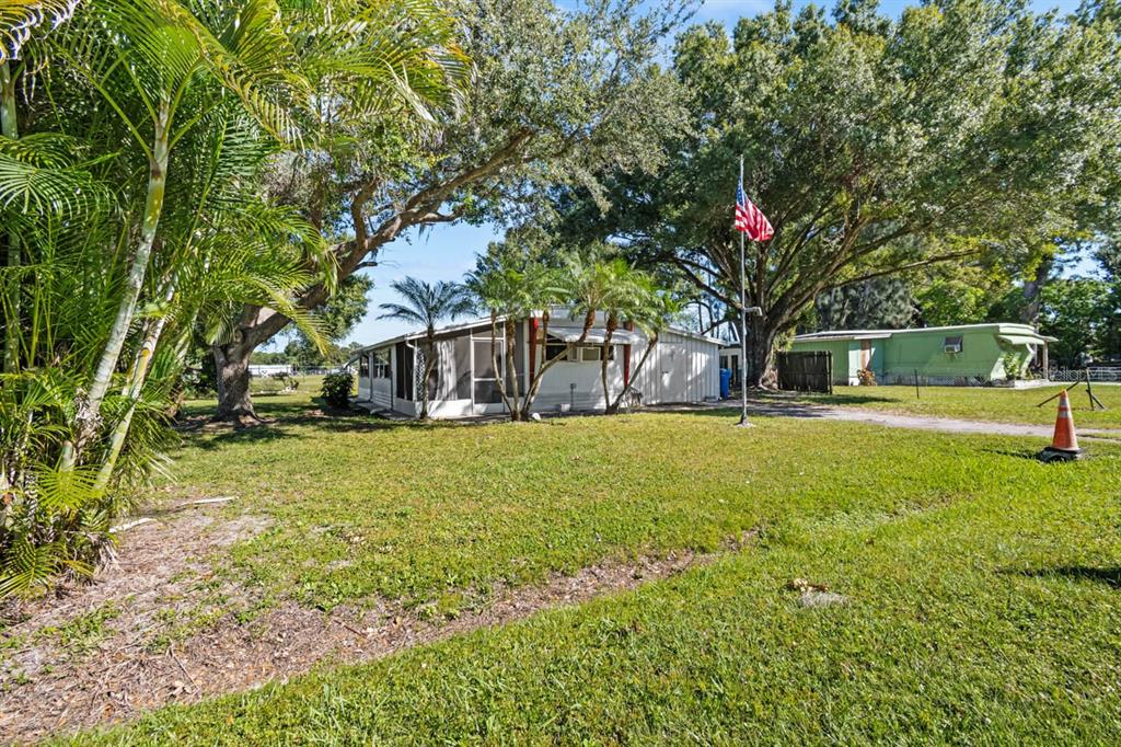 105 Domino Drive North Ruskin, FL 33570 - Photo 3 of 12 a view of a house with a yard