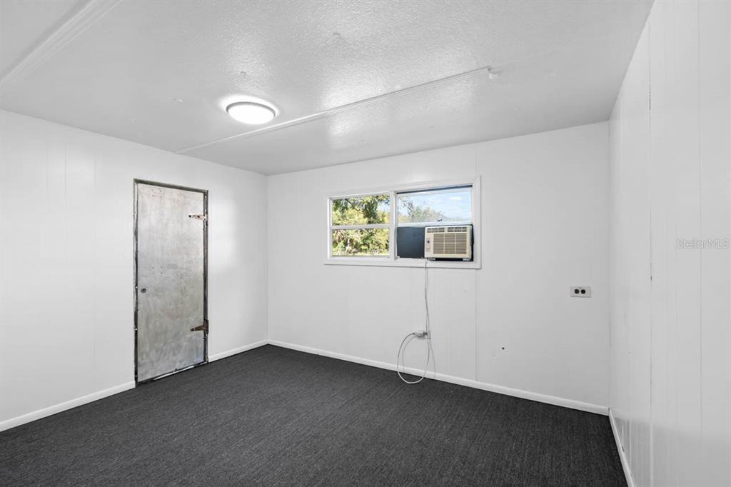 105 Domino Drive North Ruskin, FL 33570 - Photo 5 of 12 an empty room with windows