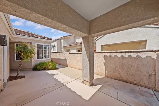 an aerial view of a house with a garden