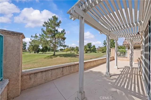 an empty room with sliding glass door and glass door