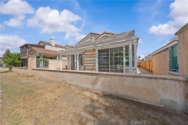 front view of a house with a large window
