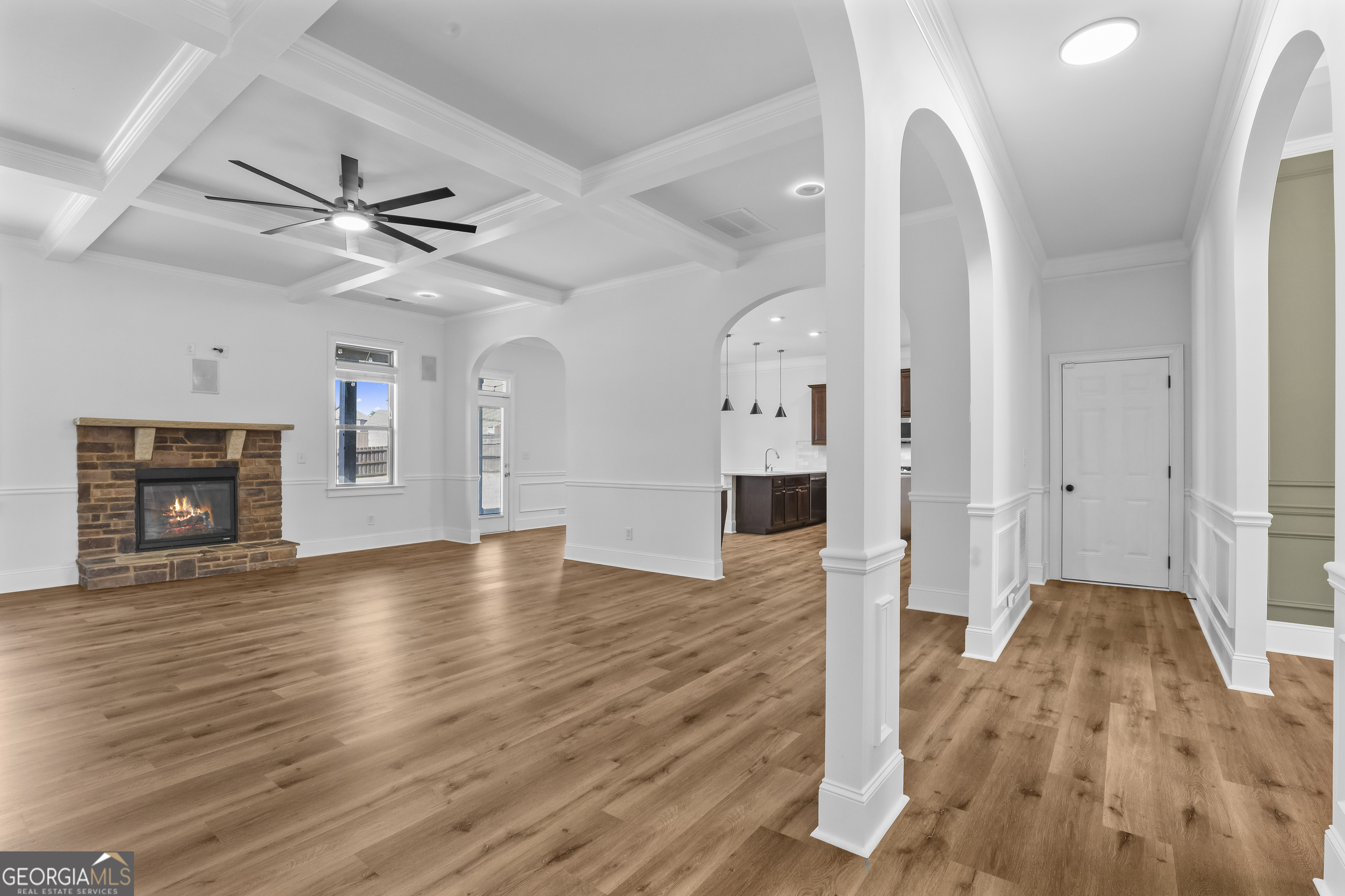 200 Snow Bird Drive Hampton, GA 30228 - Photo 11 of 55 wooden floor in an empty room with a fireplace