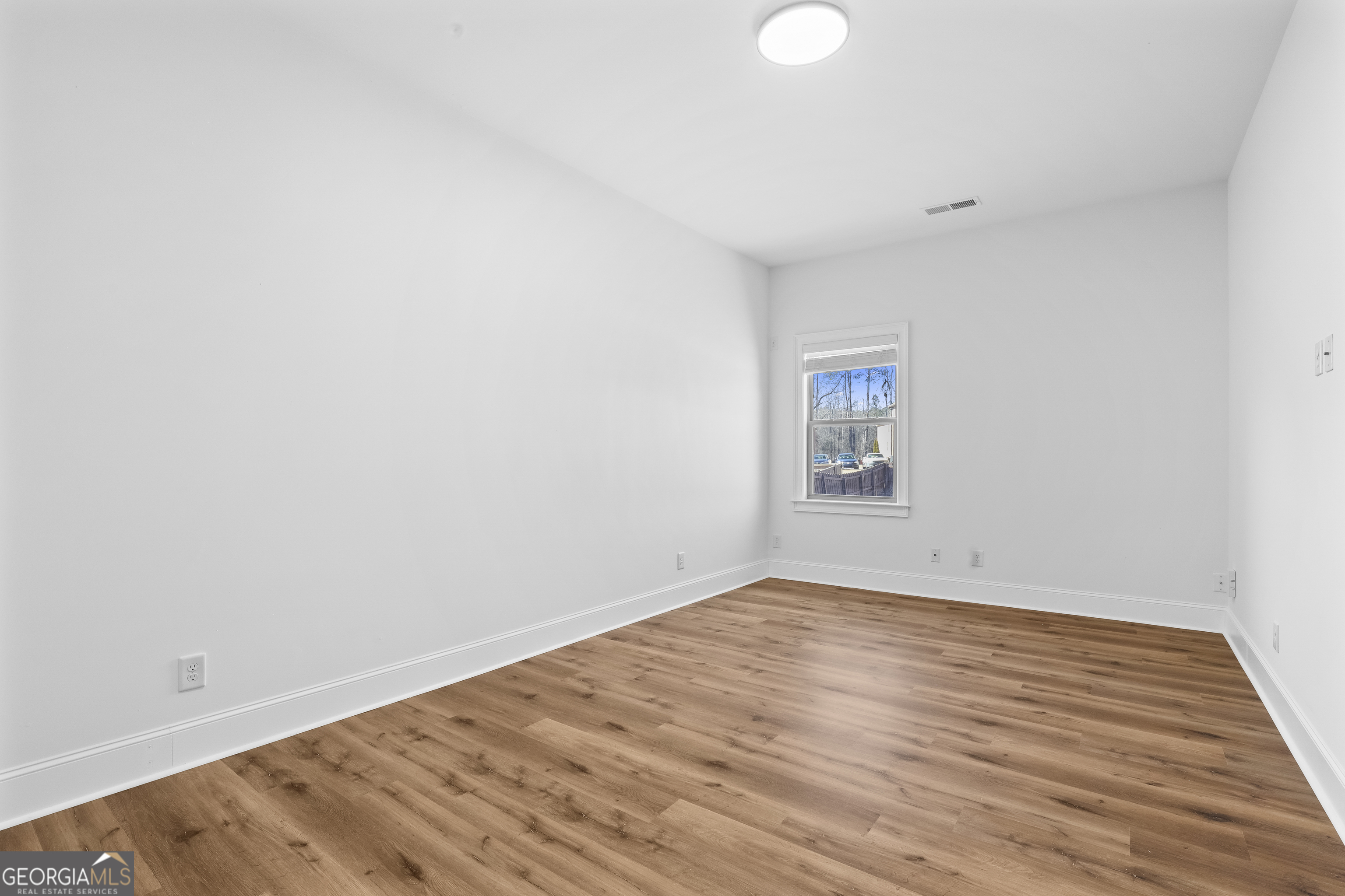 200 Snow Bird Drive Hampton, GA 30228 - Photo 19 of 55 wooden floor in a room