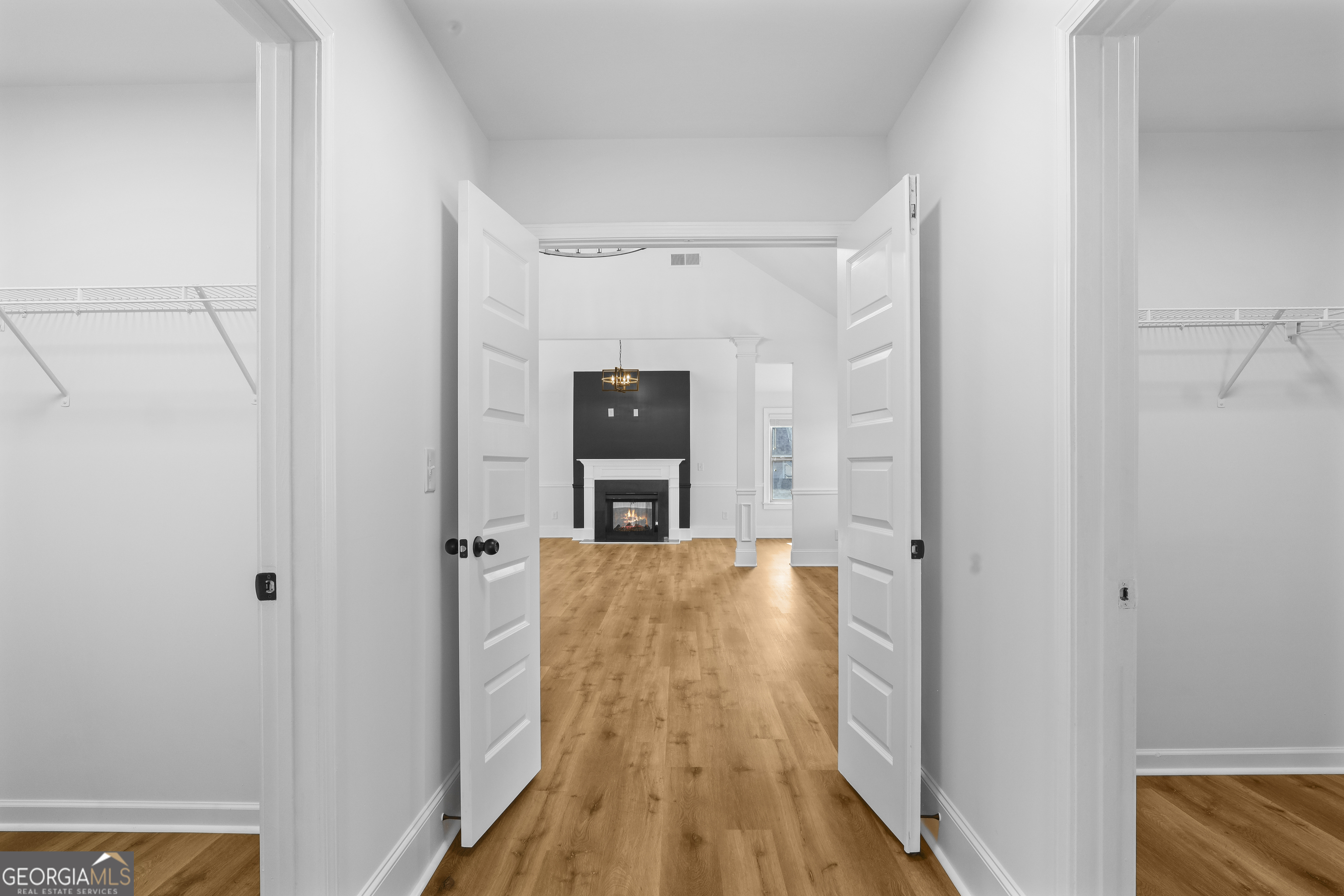 200 Snow Bird Drive Hampton, GA 30228 - Photo 33 of 55 a view of a hallway with wooden floor and staircase