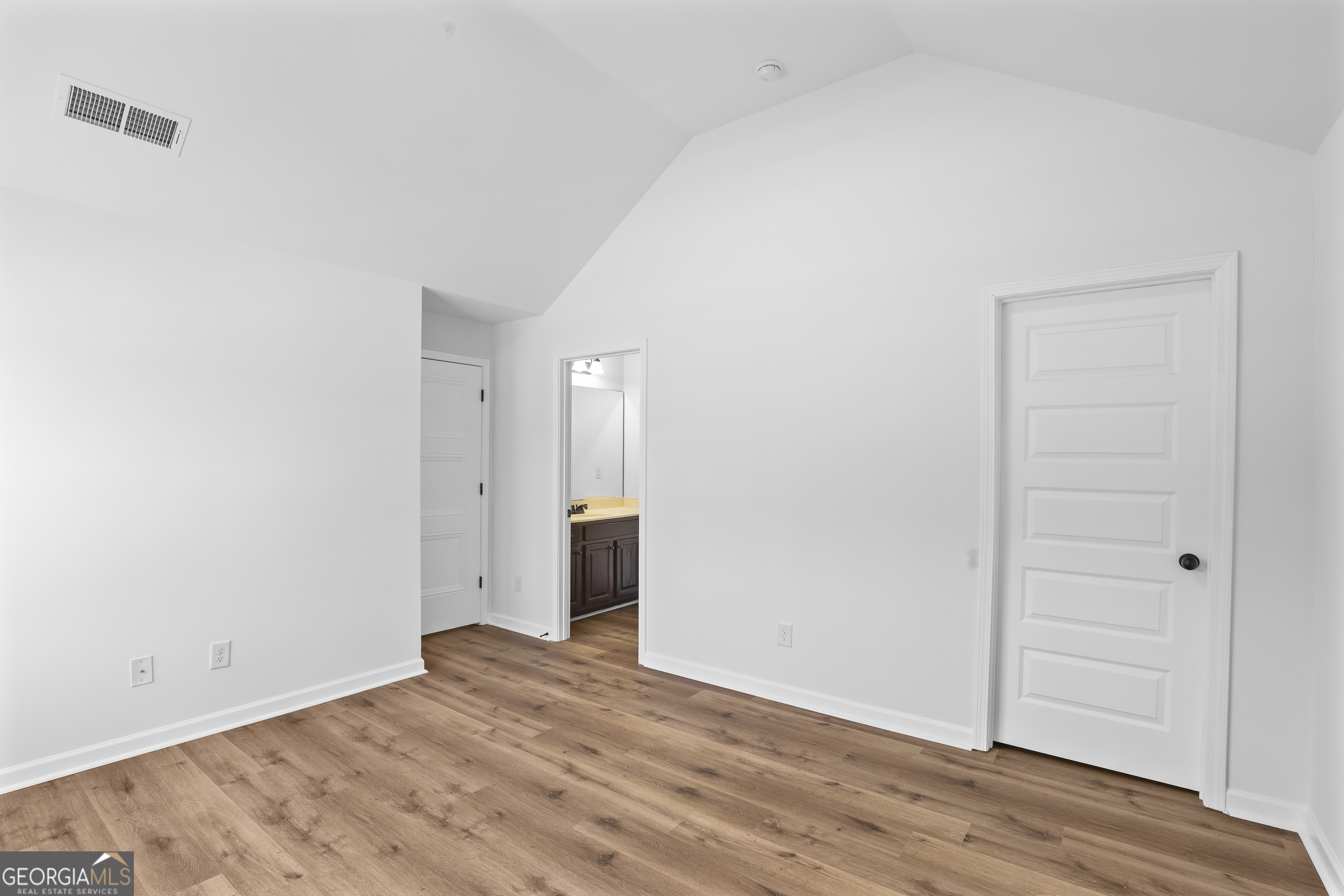 200 Snow Bird Drive Hampton, GA 30228 - Photo 36 of 55 wooden floor in an empty room