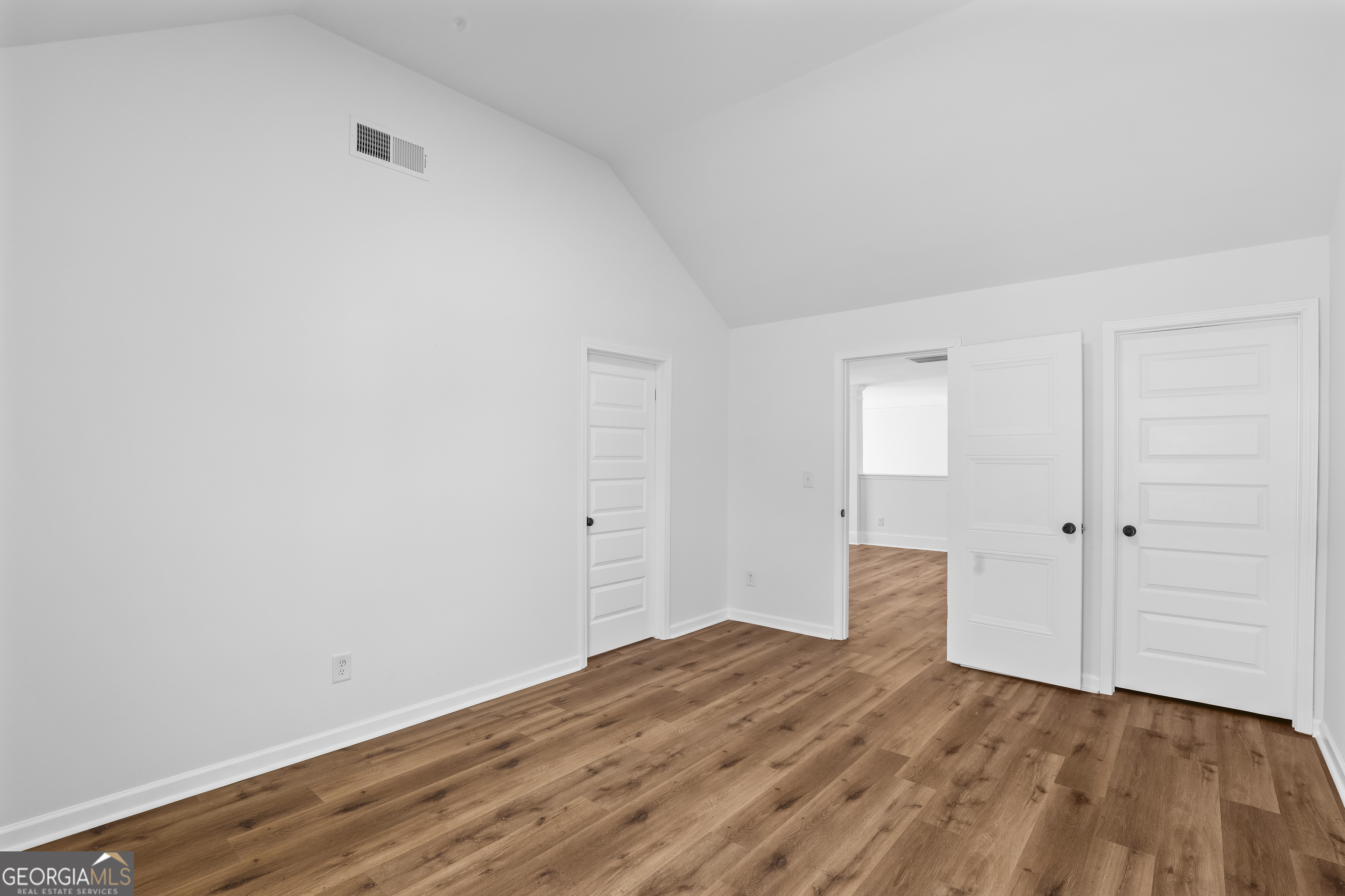 200 Snow Bird Drive Hampton, GA 30228 - Photo 39 of 55 a view of empty room with wooden floor