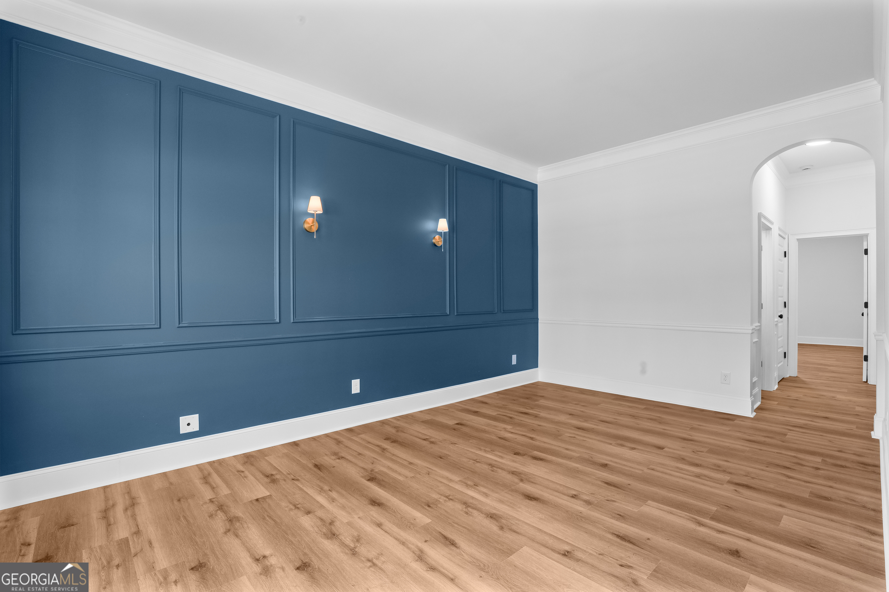 200 Snow Bird Drive Hampton, GA 30228 - Photo 4 of 55 a view of an empty room with wooden floor