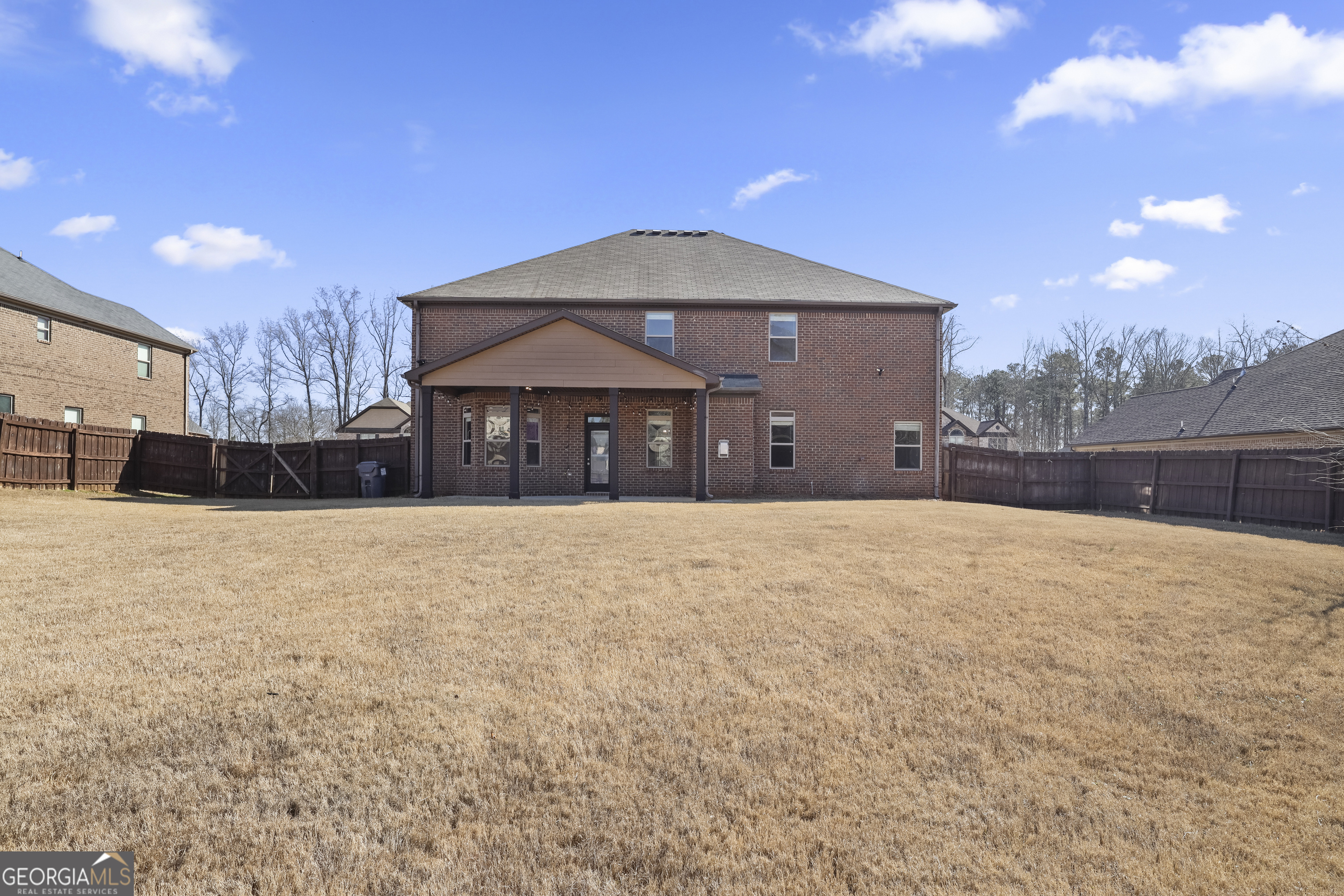 200 Snow Bird Drive Hampton, GA 30228 - Photo 48 of 55 a front view of a house with a yard