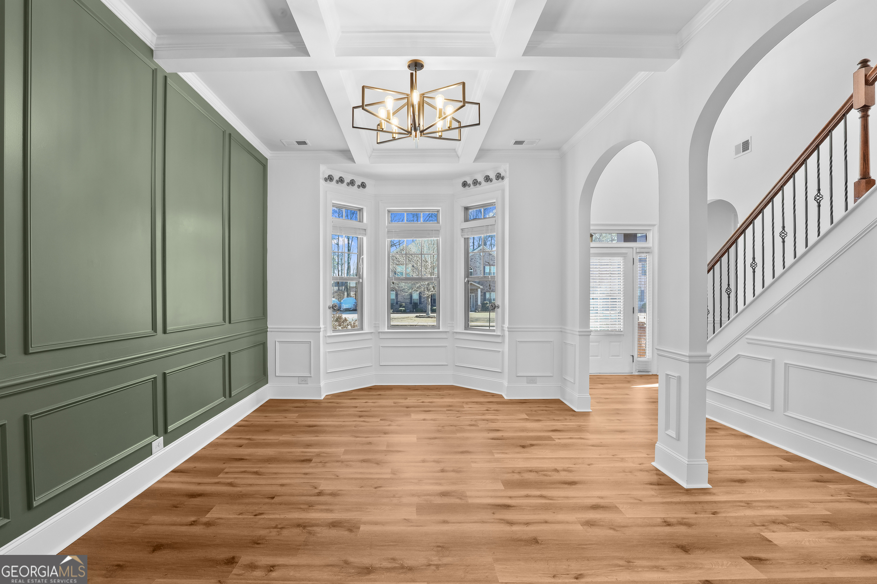 200 Snow Bird Drive Hampton, GA 30228 - Photo 6 of 55 a view of an entryway with wooden floor and door