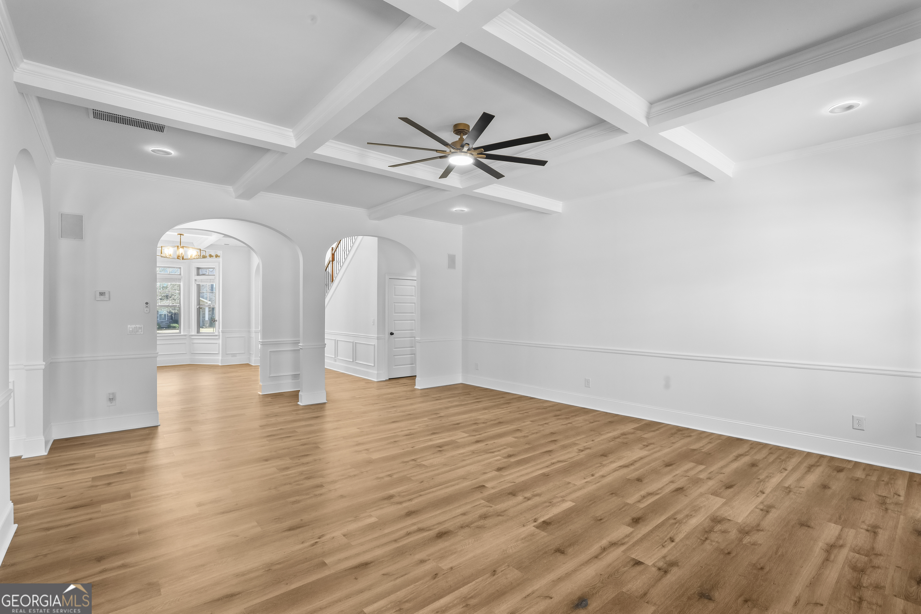 200 Snow Bird Drive Hampton, GA 30228 - Photo 10 of 55 wooden floor in an empty room with a window