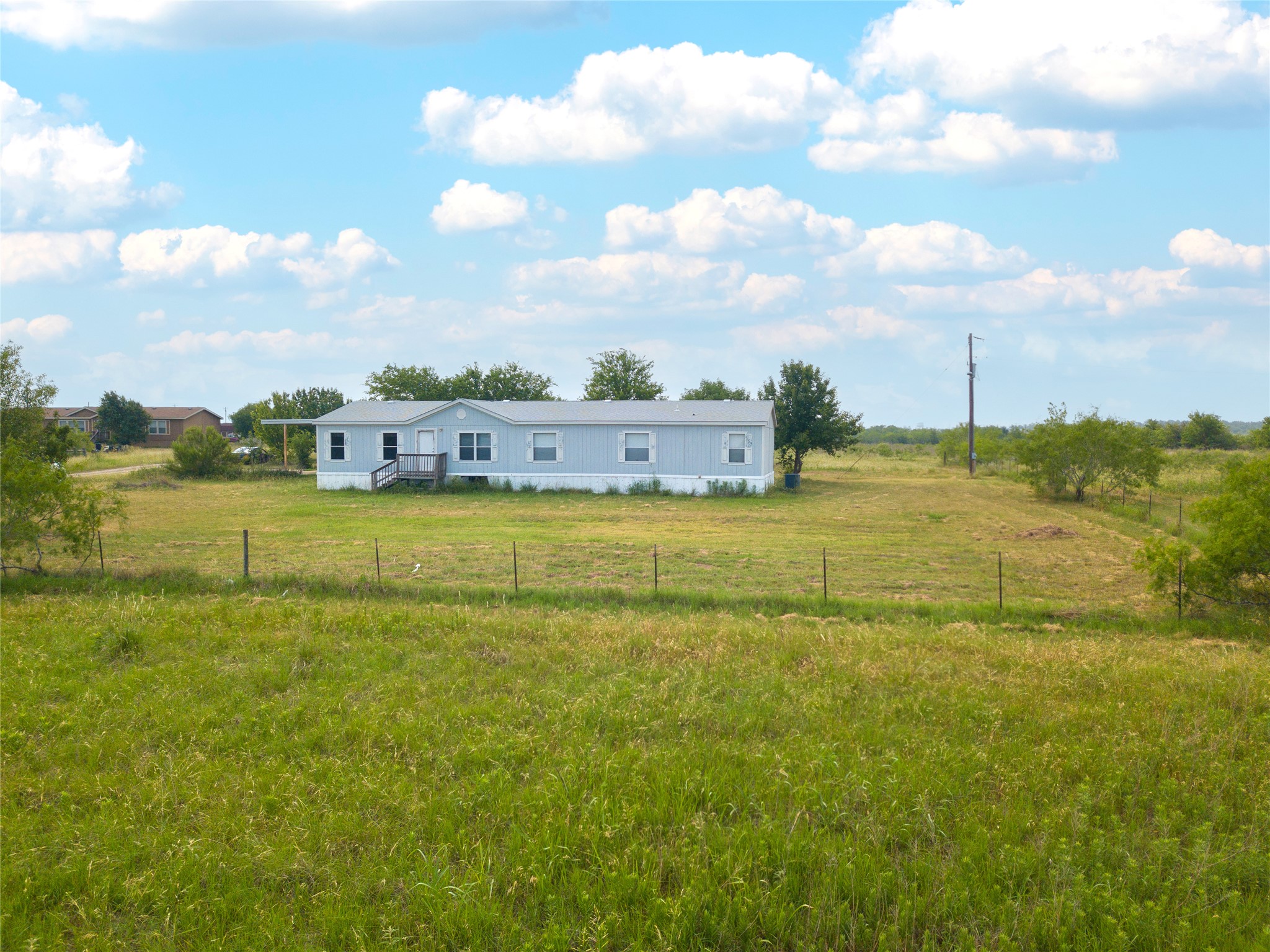 1 11209-tract Road Del Valle, TX 78617 - Photo 5 of 39 View of yard featuring a view of rural / pastoral area