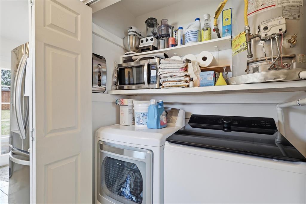 10029 Shadyview Drive Dallas, TX 75238 - Photo 12 of 30 a utility room with dryer and washer
