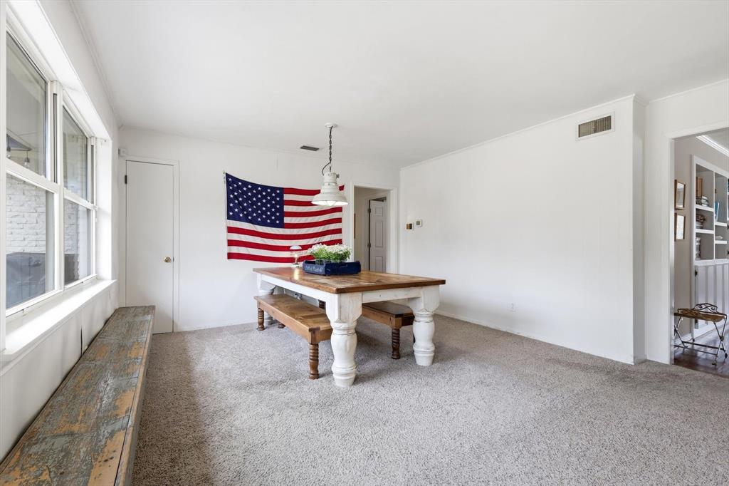 10029 Shadyview Drive Dallas, TX 75238 - Photo 13 of 30 a view of a workspace with furniture and a window