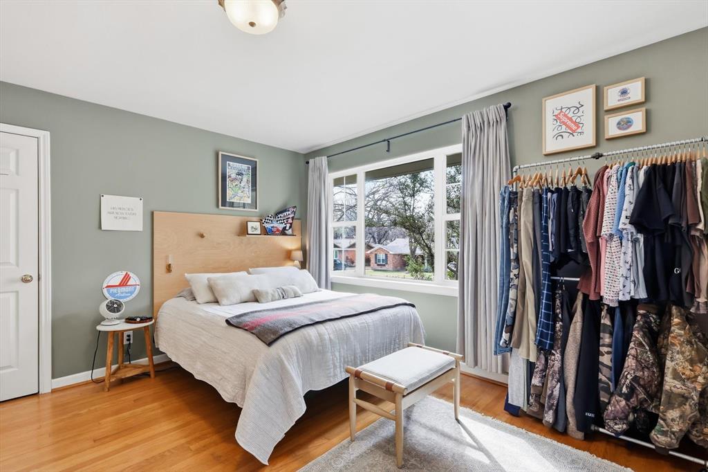 10029 Shadyview Drive Dallas, TX 75238 - Photo 17 of 30 a bedroom with a bed and a window