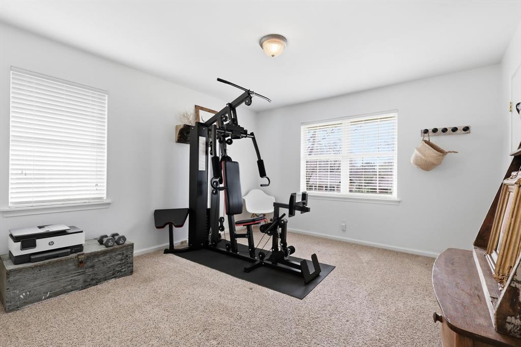 10029 Shadyview Drive Dallas, TX 75238 - Photo 21 of 30 a view of a room with gym equipment