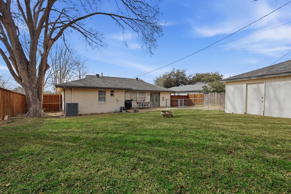 10029 Shadyview Drive Dallas, TX 75238 - Photo 26 of 30 a view of a yard in front of a house