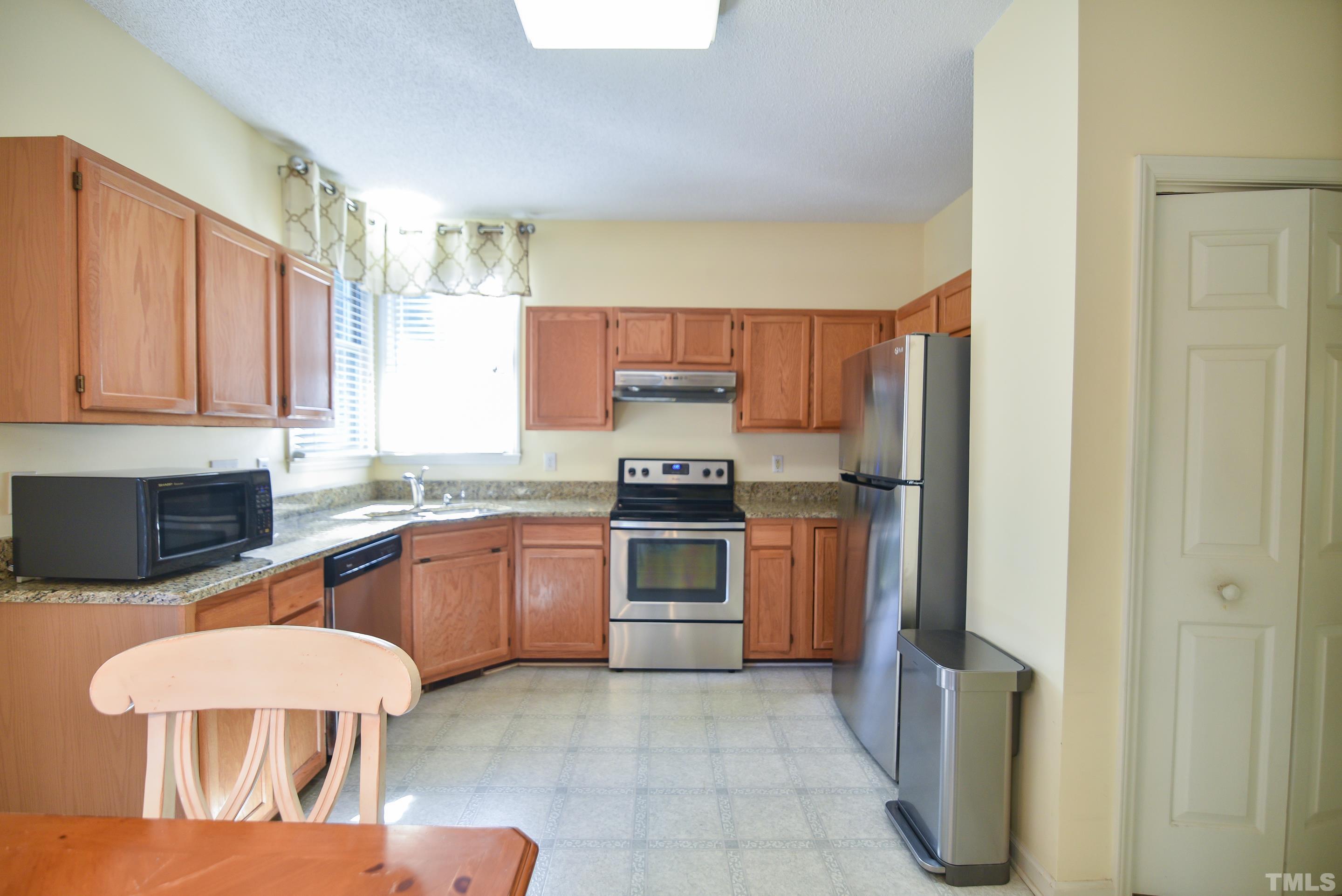 9320 Carisbrook Court Raleigh, NC 27615 - Photo 18 of 18 Open floor plan is perfect for entertaining!