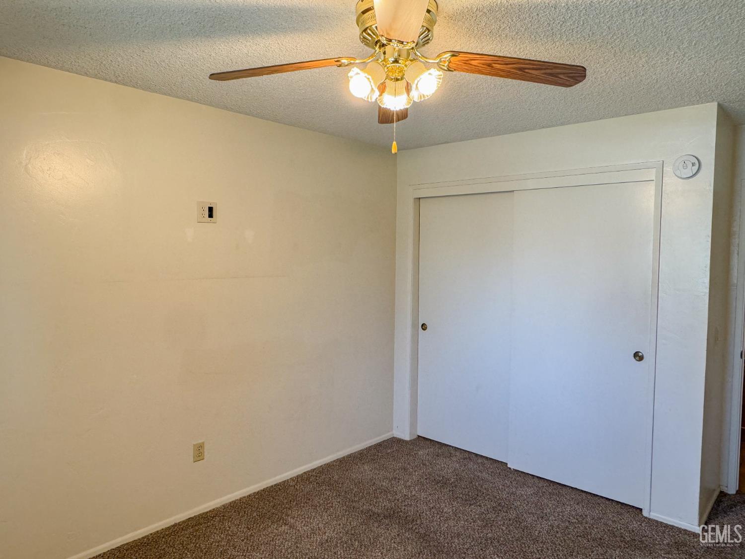 Undisclosed Address Bakersfield, CA 93309 - Photo 18 of 38 a view of a chandelier fan in a room