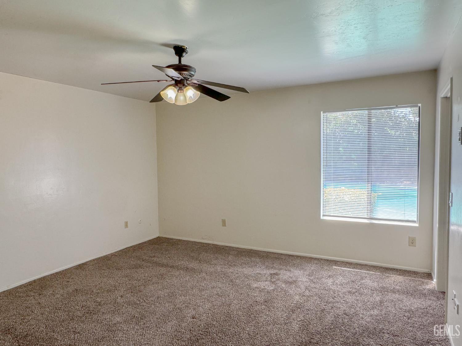 Undisclosed Address Bakersfield, CA 93309 - Photo 22 of 38 a view of empty room with window