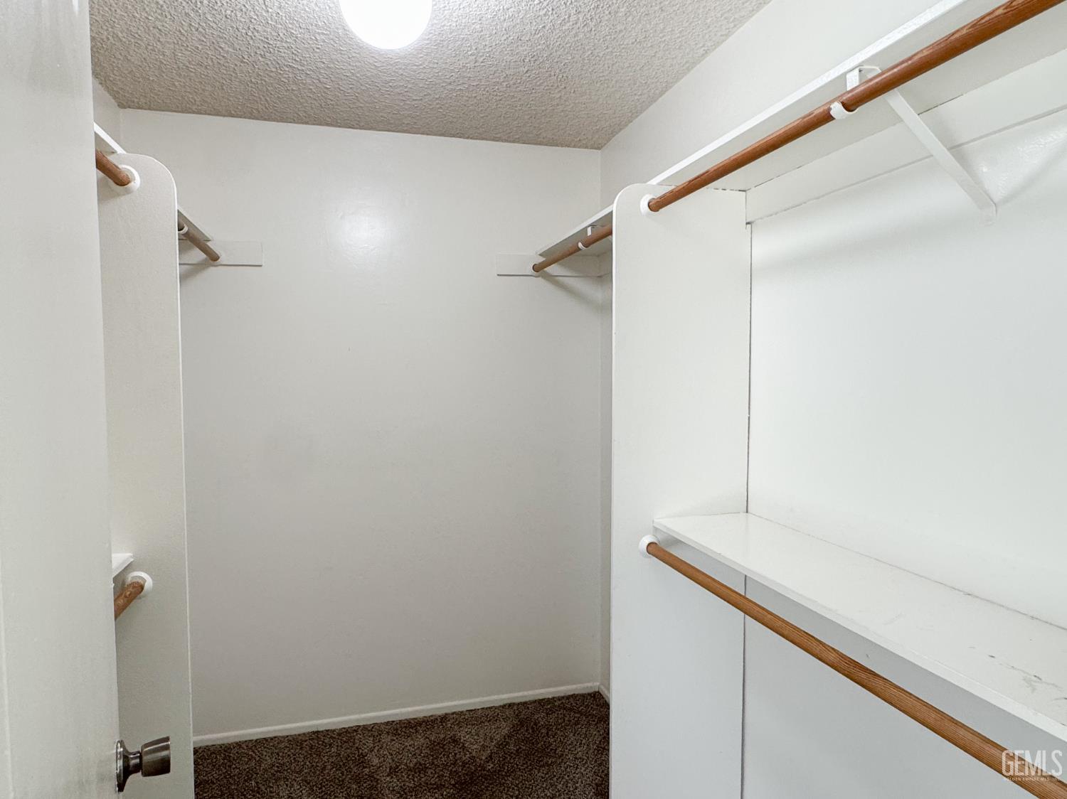 Undisclosed Address Bakersfield, CA 93309 - Photo 25 of 38 a bathroom with a shower and a shower curtain