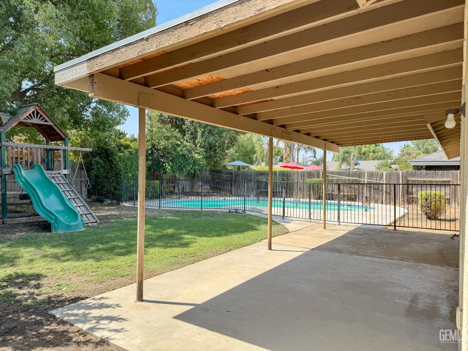Undisclosed Address Bakersfield, CA 93309 - Photo 29 of 38 a view of a backyard with a slide