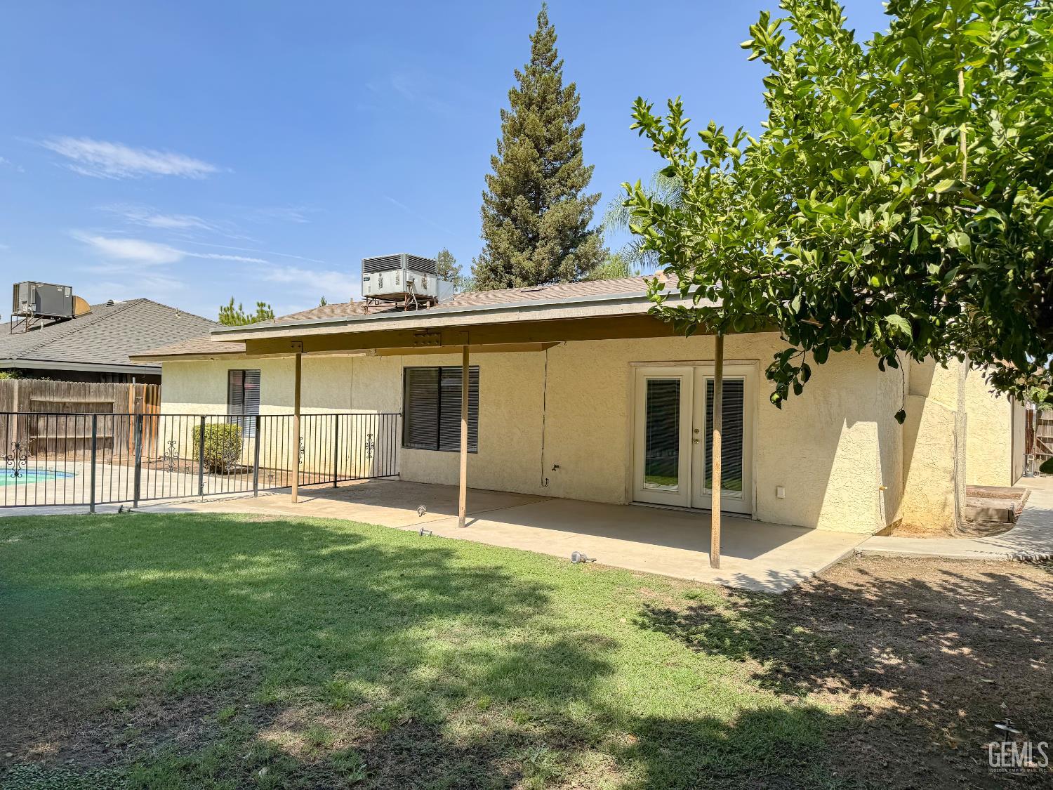 Undisclosed Address Bakersfield, CA 93309 - Photo 30 of 38 a view of a house with a yard