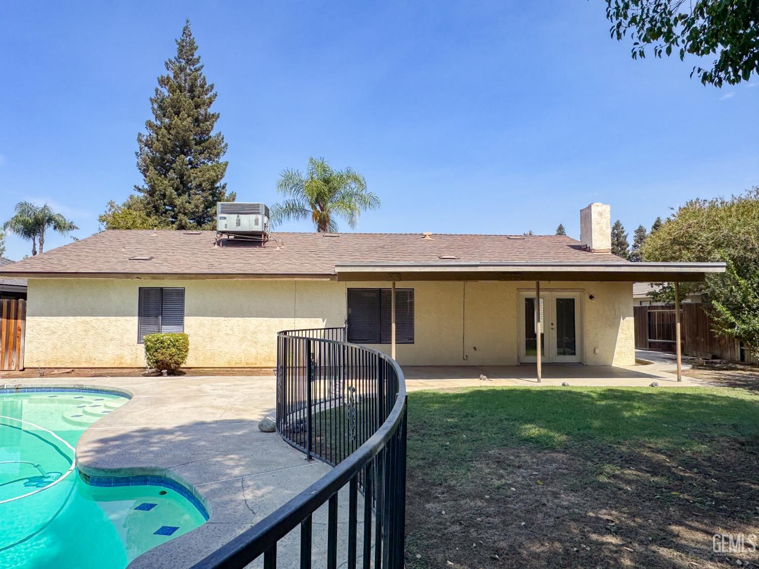 Undisclosed Address Bakersfield, CA 93309 - Photo 32 of 38 a front view of a house with garden