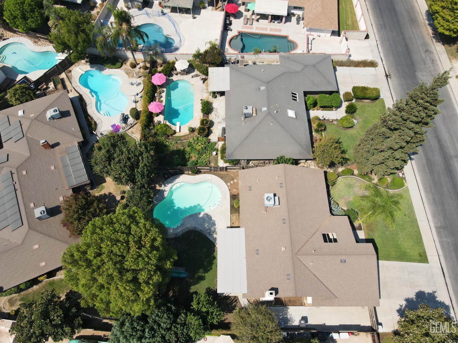 Undisclosed Address Bakersfield, CA 93309 - Photo 38 of 38 an aerial view of a house with a yard and a fountain