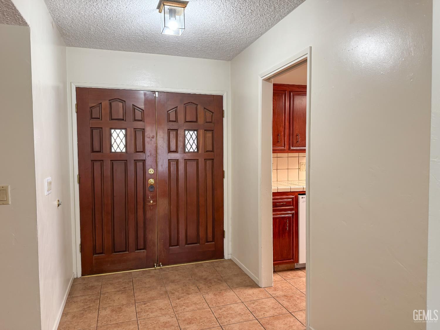 Undisclosed Address Bakersfield, CA 93309 - Photo 4 of 38 a view of a hallway with elevator