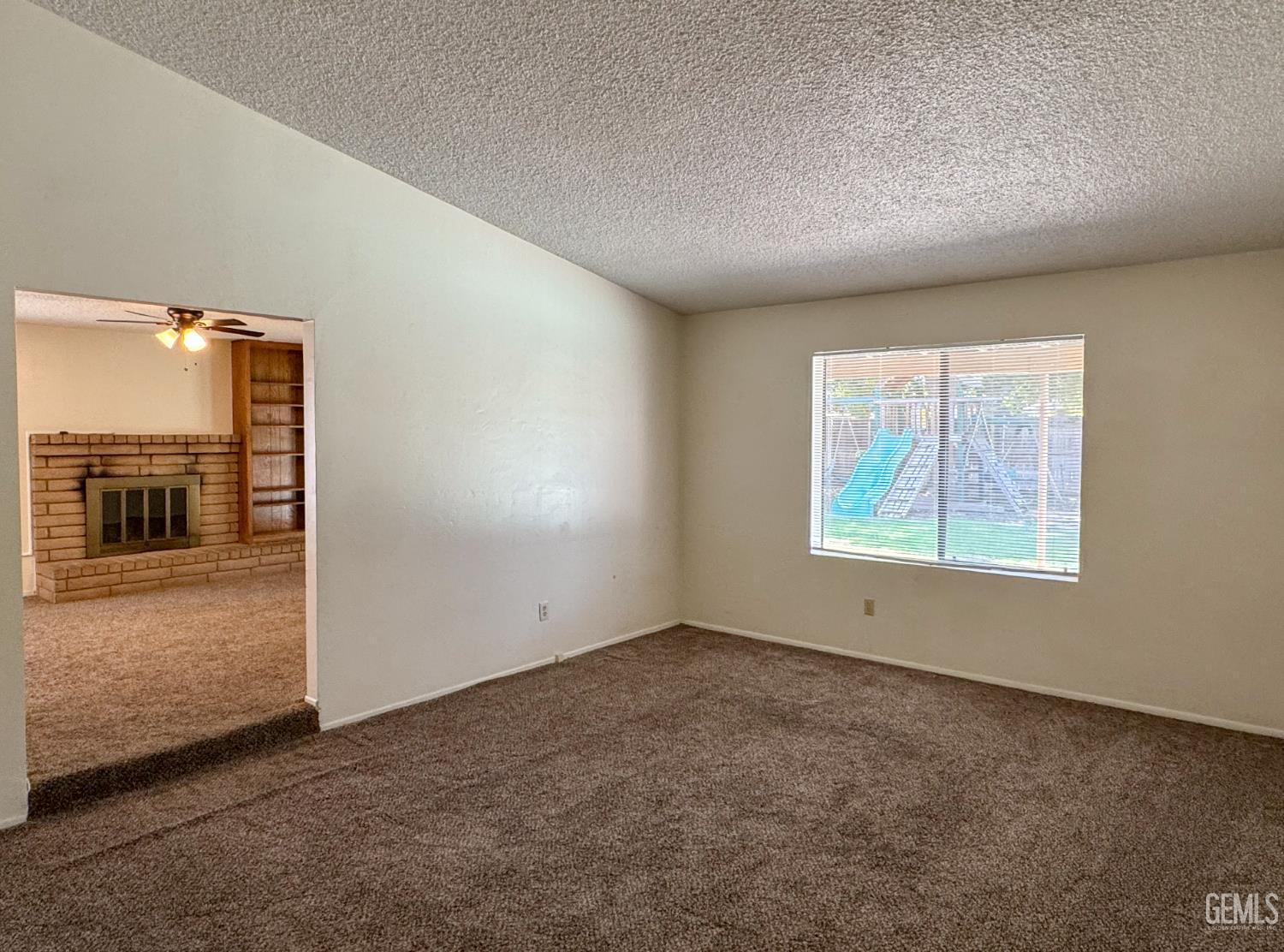Undisclosed Address Bakersfield, CA 93309 - Photo 5 of 38 an empty room with windows