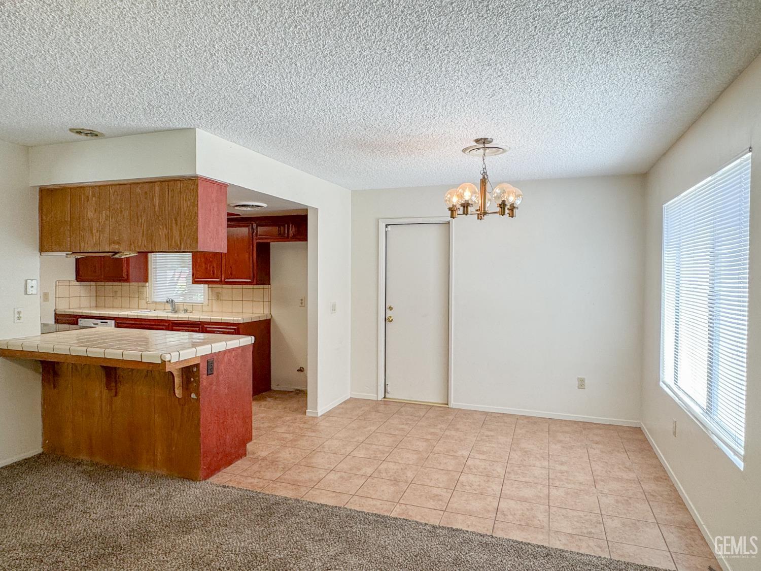 Undisclosed Address Bakersfield, CA 93309 - Photo 10 of 38 a kitchen with stainless steel appliances granite countertop a sink stove and refrigerator