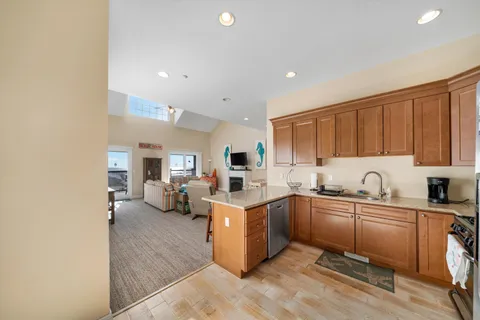 a kitchen with a sink and cabinets
