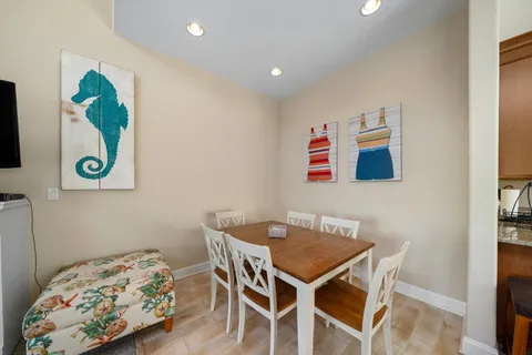 a bedroom with a bed and a table in it