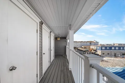 a balcony with view of city