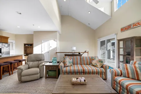 a bedroom with furniture and wooden floor