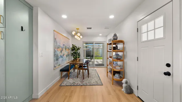 a view of a livingroom with furniture and wooden floor