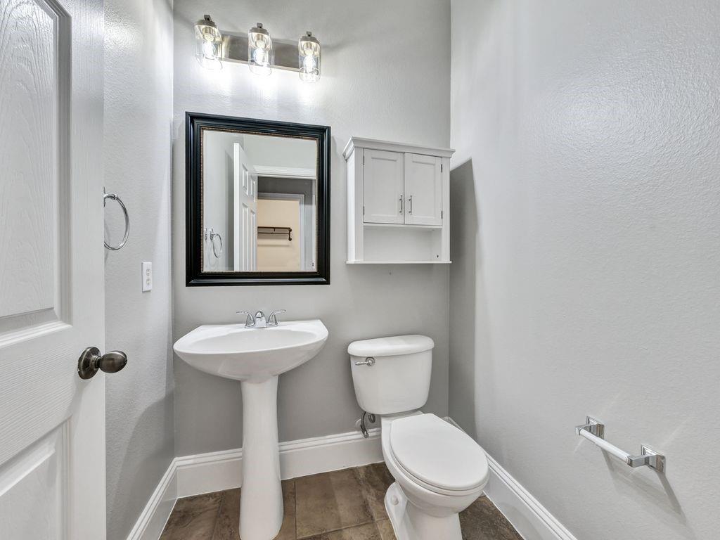 920 Ethan Road Argyle, TX 76226 - Photo 22 of 40 Downstairs Powder Room