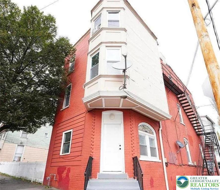 201 Ridge Avenue, Unit 3B Allentown, PA 18102 - Photo 2 of 12 a building with a clock on the top
