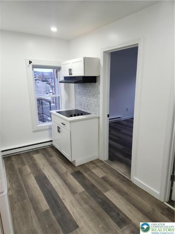 201 Ridge Avenue, Unit 3B Allentown, PA 18102 - Photo 7 of 12 a kitchen with a stove and a refrigerator