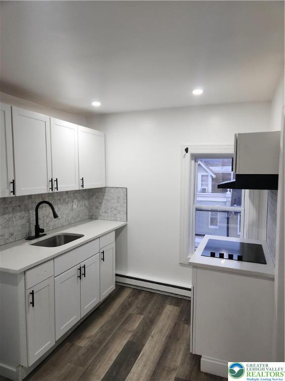 201 Ridge Avenue, Unit 3B Allentown, PA 18102 - Photo 8 of 12 a kitchen with stainless steel appliances granite countertop a sink and cabinets